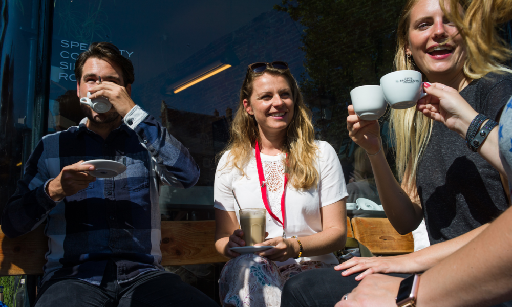 Friends sharing a laugh over coffee