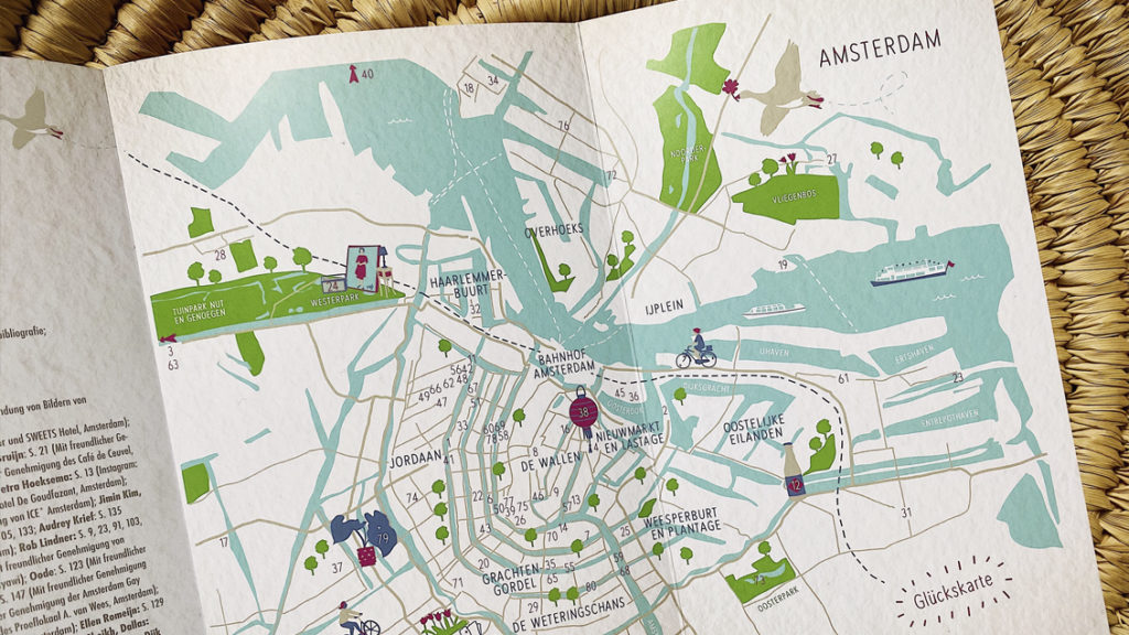 Alle Glücksorte Amsterdams auf einem Blick im Buchrücken des Glücksorte-Reiseführers von Theresa Huber und Barbara Klingelhöfer