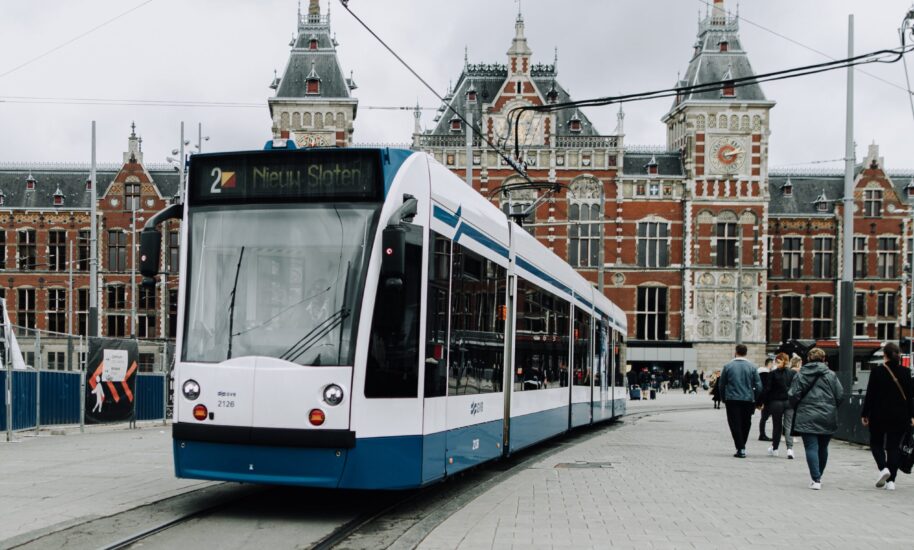 A white and blue tram in Amsterdam