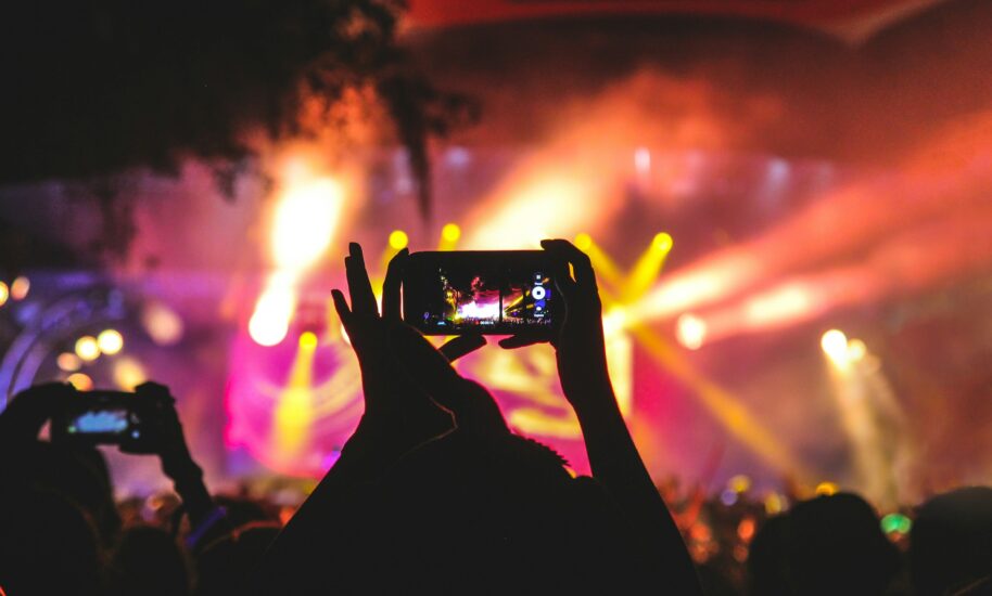 A crowd recording a live concert with their phones
