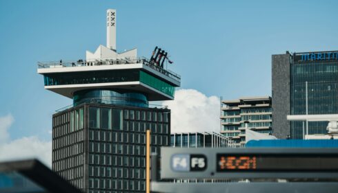 Modern buildings in Amsterdam city centre. A tall building with a distinctive design